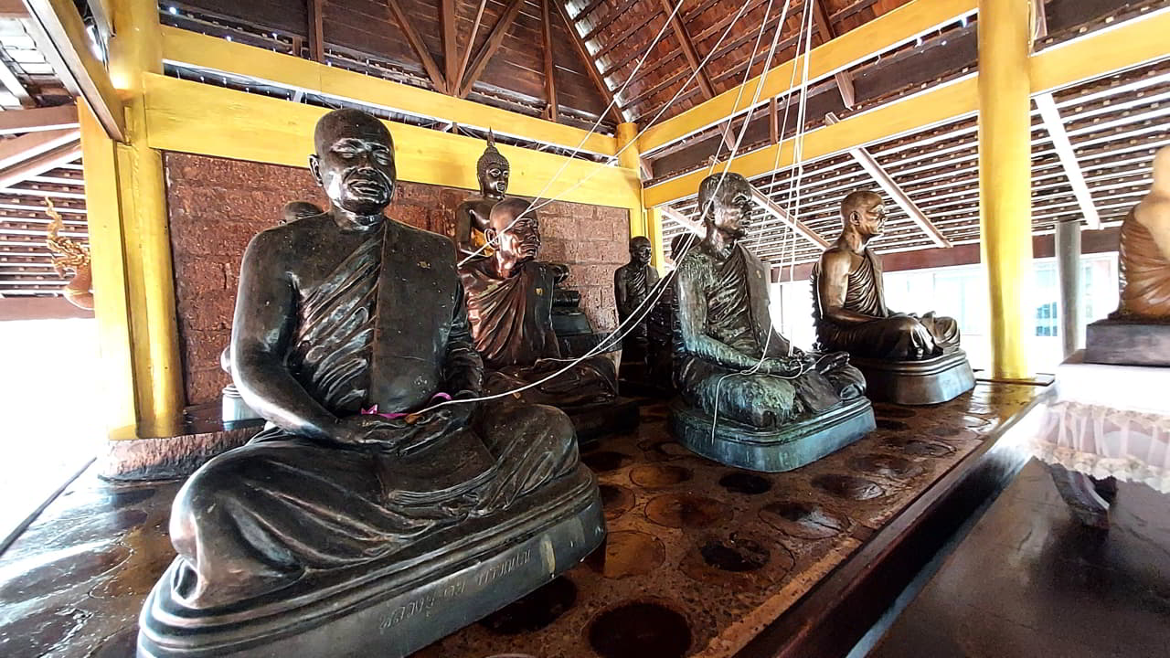 One of the altars at Wat Phu Prao featuring images of the Buddha